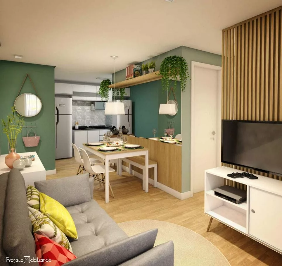 Amplitude com toques verdes e uso da madeira para compor uma sala verede