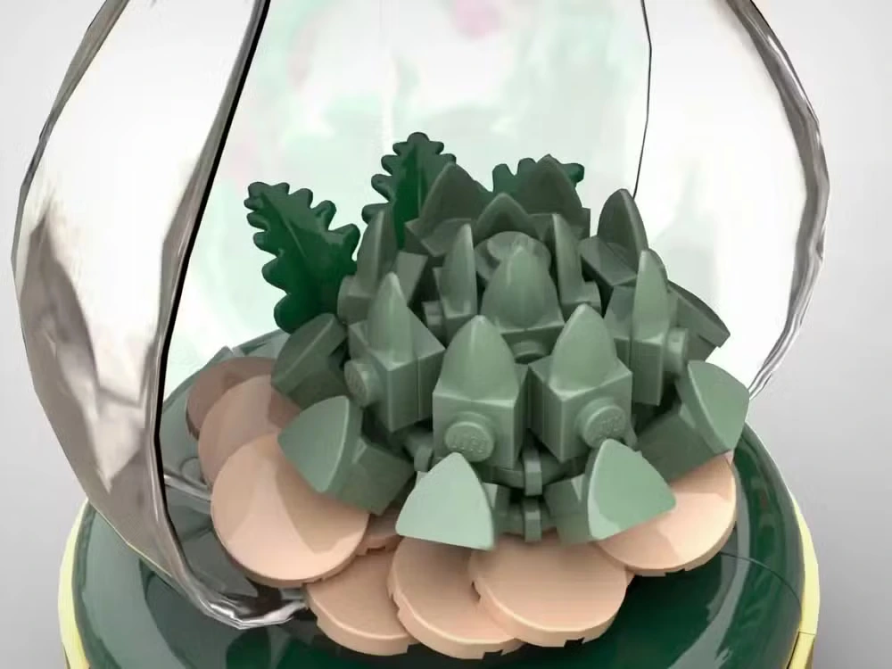 Terrários de LEGO encantam com orquídea, bonsai e suculentas em frascos transparentes