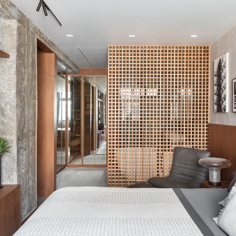 Loft contemporâneo em Copacabana revela estética industrial e vida cosmopolita em 180 m²