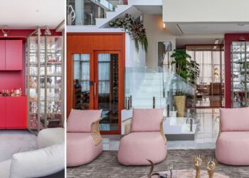 Próxima à adega climatrizada, a cristaleira vermelha e sob medida, projetada pela arquiteta Cristiane Schiavoni, tem na parte central o bar com as bebidas destiladas | Fotos: Carlos Piratininga