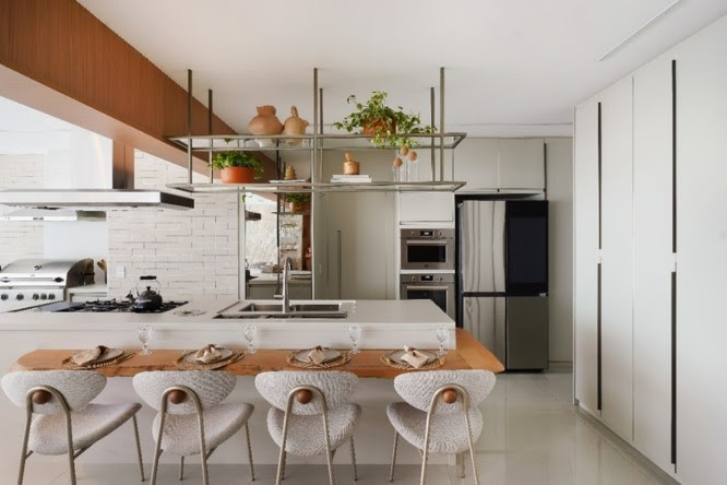 Cozinhas conectadas com as áreas gourmet potencializam o setor gastronômico nos projetos residenciais