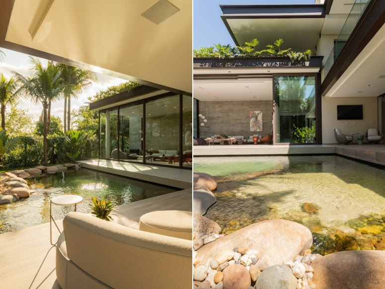 Lago na área externa protagoniza projeto residencial que une paisagismo com arquitetura moderna