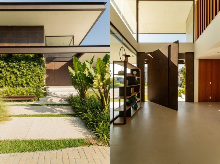 Lago na área externa protagoniza projeto residencial que une paisagismo com arquitetura moderna