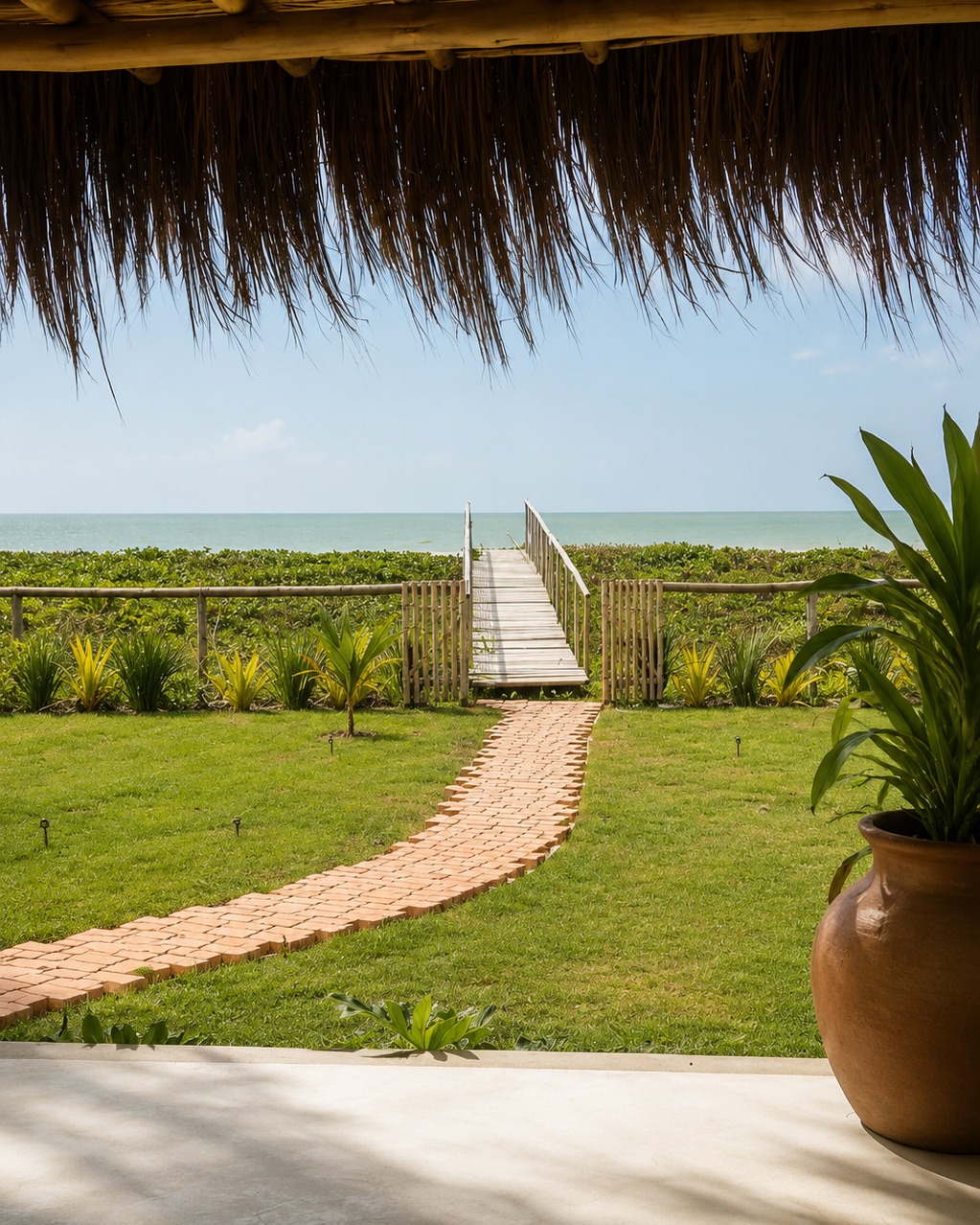 Casa de praia no extremo sul da Bahia troca o óbvio litorâneo pela taipa, pelo bambu e pela palha
